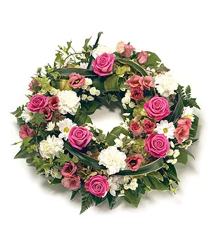 Traditional round wreath with pink.jpg