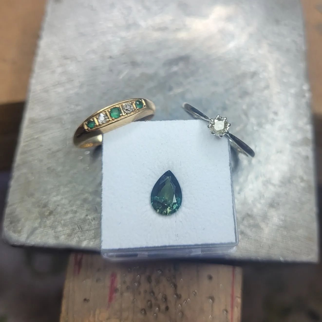 BESPOKE
One of my favourite parts of being a jeweller is remodelling and recycling special pieces into something that can be worn again.
On this piece we chose a gorgeous green sapphire with colours of teal to be a centrepiece to join this sentimenta