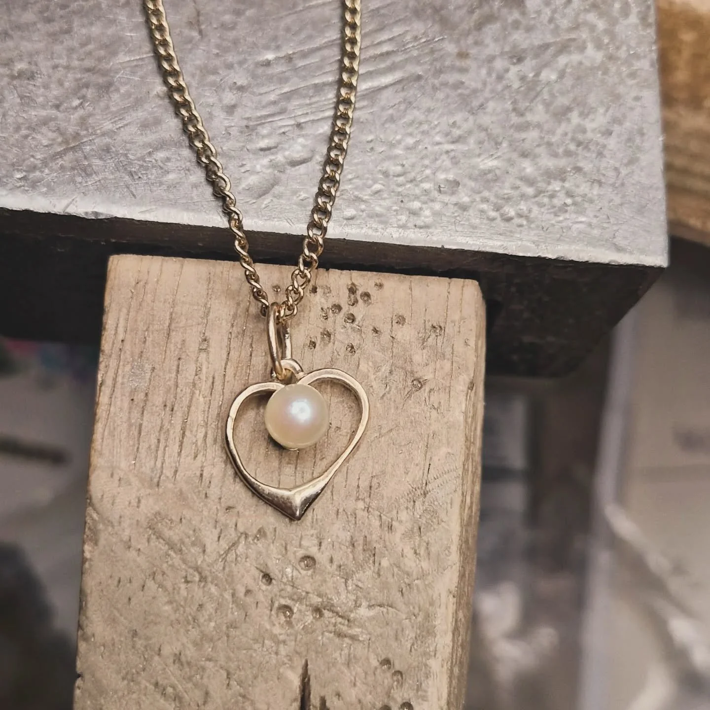 REMODEL
A sentimental unworn pearl ring becomes a pendant for lovely A. Keeping the ring as original as possible, reshaping the delicate shank to form the heart and repairing and re-using the pearl setting, adding a bail so a vintage chain can be use