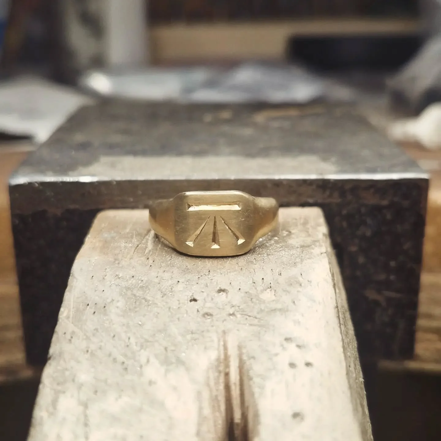 BESPOKE
Had the absolute pleasure of making this beauty for a lovely client. 
Hand forged signet ring, crafted from remodelling highly sentimental heirloom 18ct cufflinks and ring. Hand engraved bench mark - inspired by ordnance survey elevation reco