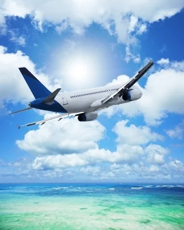 24815029_S_Plane_Ocean_Sky_Clouds.jpg