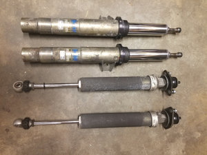 Modified Öhlins SportLine struts top. Modified Öhlins Motorsport dampers bottom.