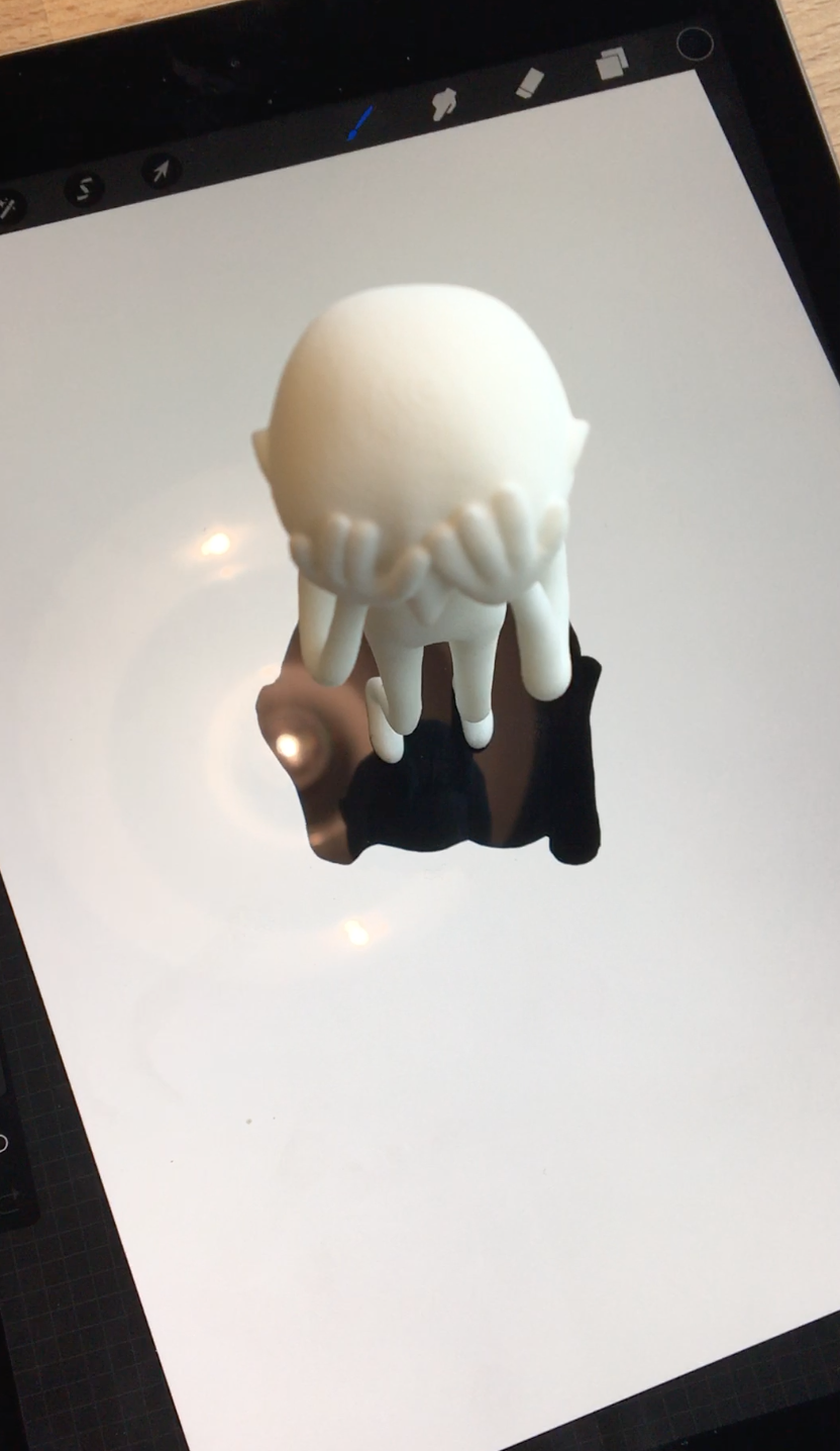 Jeg lyssatte figuren, tegnet etter formen til skyggen på iPad, så sendte jeg fil til skjæring.
