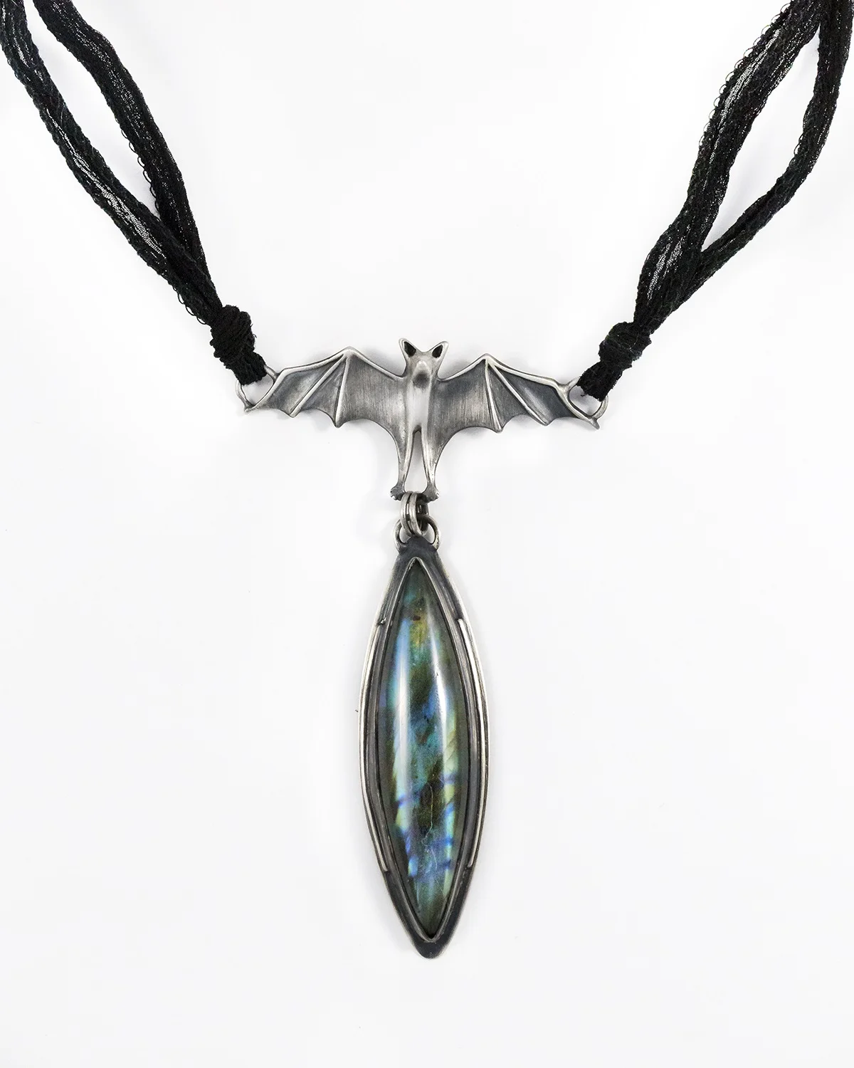 bat with long labradorite and a secret front.jpg
