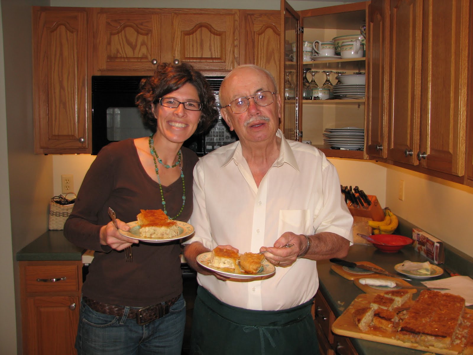   Bill Dilios (left) shares his favorite food from his childhood in Politsani, Albania, with chef Lindsay Sterling (right).  