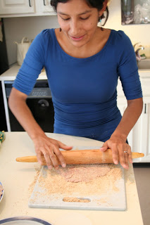  Coat each side with breadcrumbs and roll flat with a rolling pin on top of the breadcrumbs, flipping the meat over whenever it starts to stick. In Bolivia, she wouldn't use a rolling pin, but a stone to do this. 