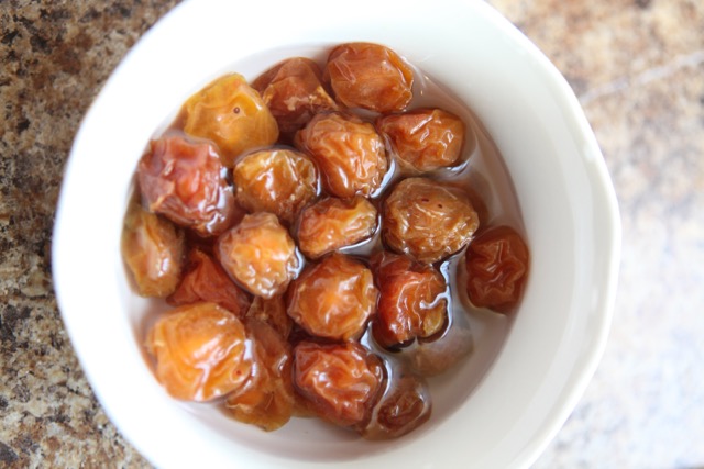   These are the sour plums, also called Persian golden prunes.  