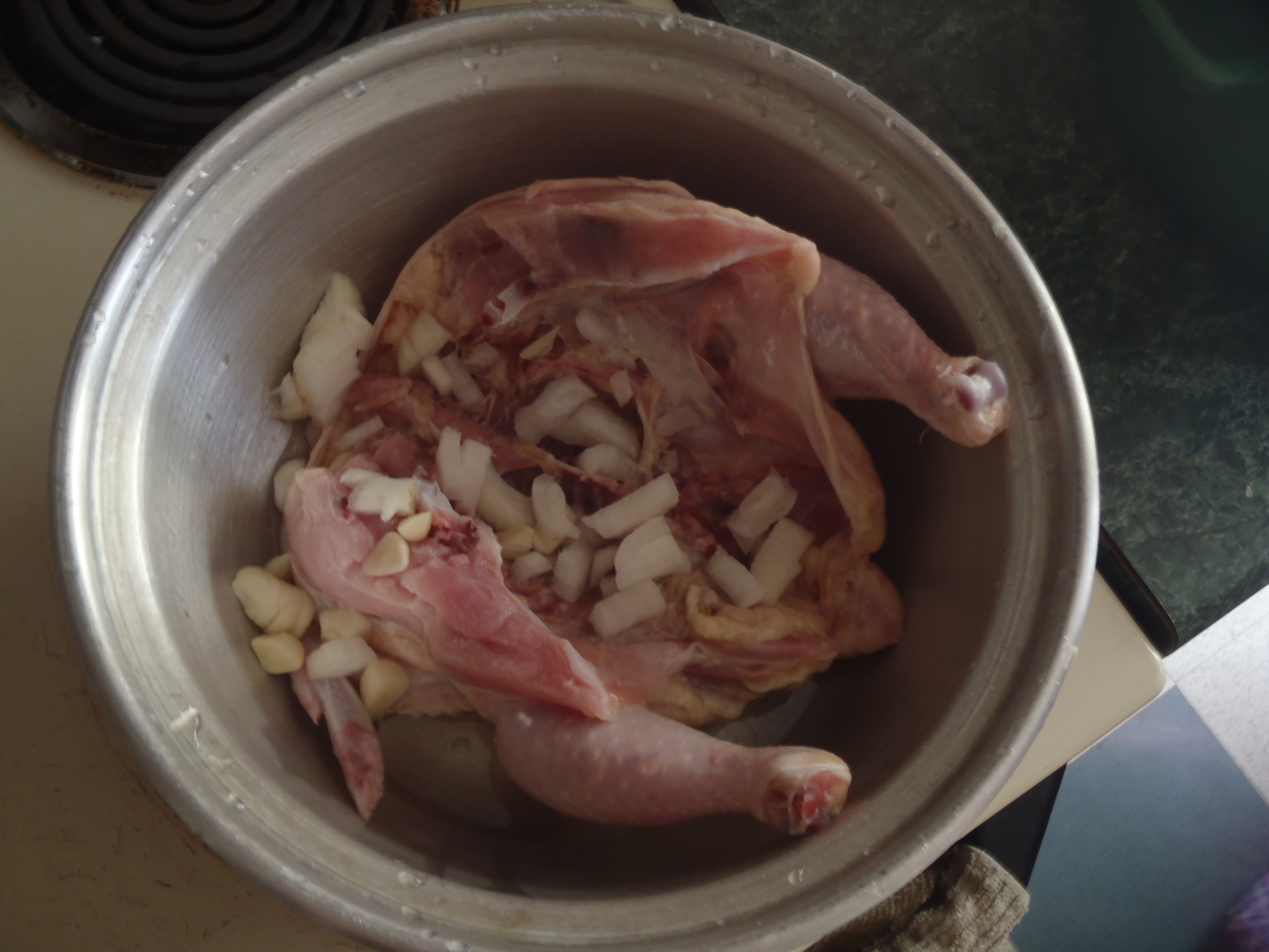  Here's the beginning - just throwing onions and a whole bunch of spices in the pot. 