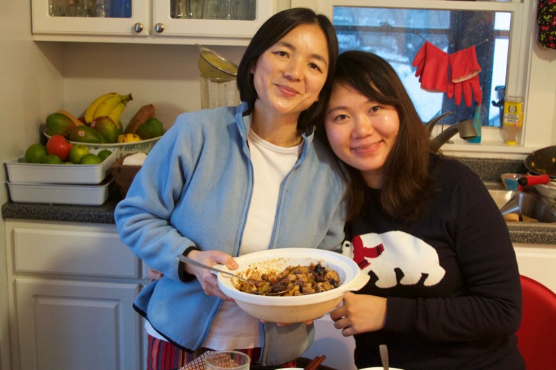 Lily Ou (left) from Guilin, China, and her friend, Peng Qiao, from Chong Qiang, China, share their Kung Pao Chicken method -- and Lily's great love story -- with us.