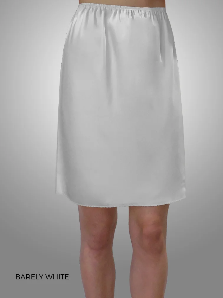 ESSENTIALS Half Slip - Barely White w words.jpg