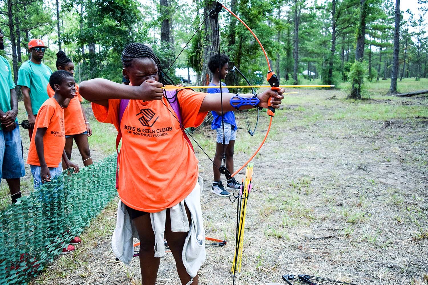 girl shooting bow and arrow.jpg