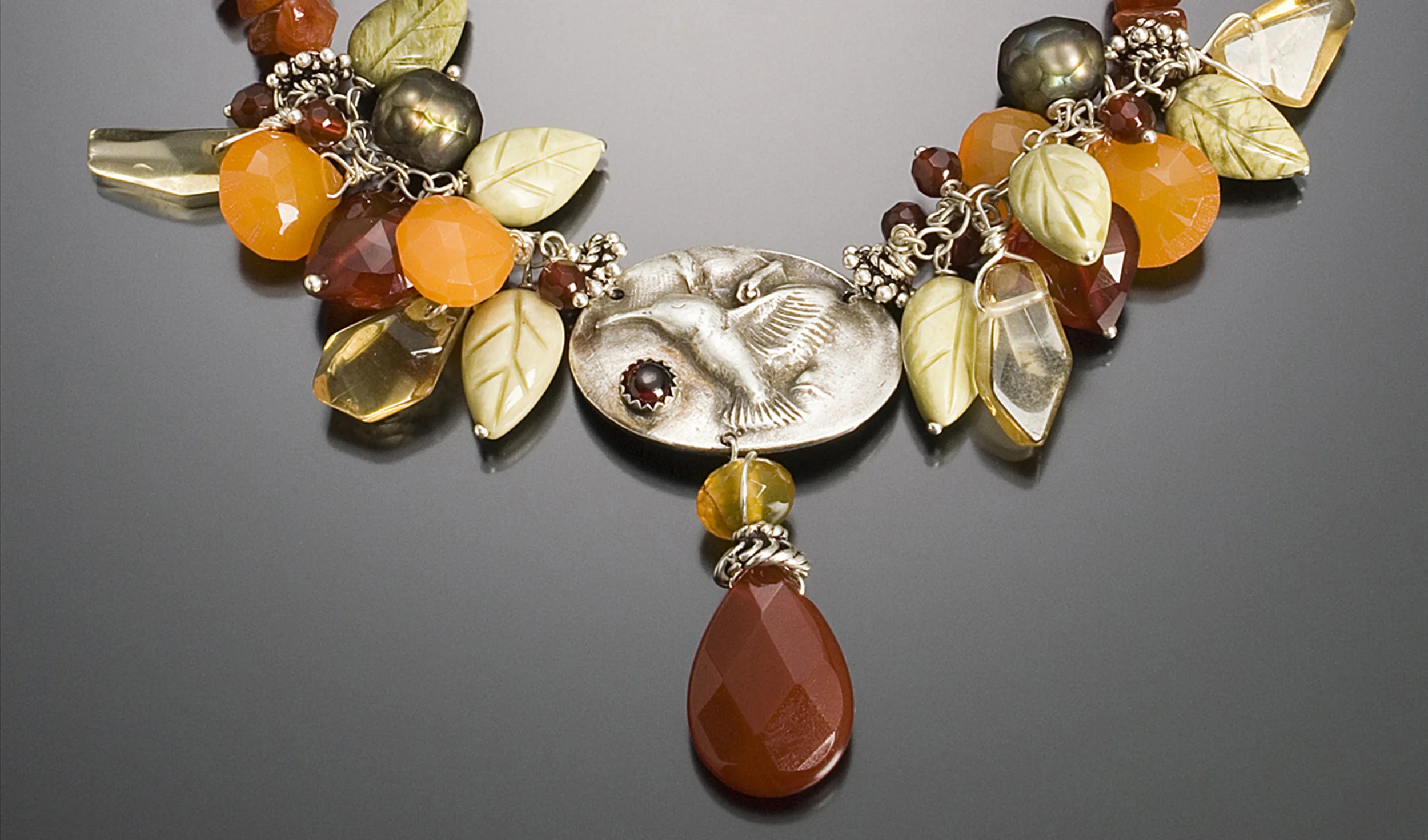 Contine, Diana Jewelry Hummingbird In Autumn.jpg