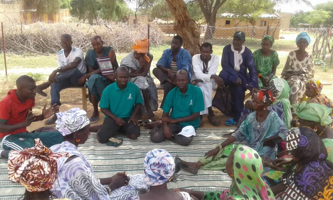 Officially introducing Sall as Garden Manager to the women and community representatives of Mbantou Croissement.