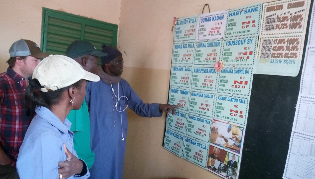 Discussing the boosted enrollment figures with the administration of Donay Taredji II school.