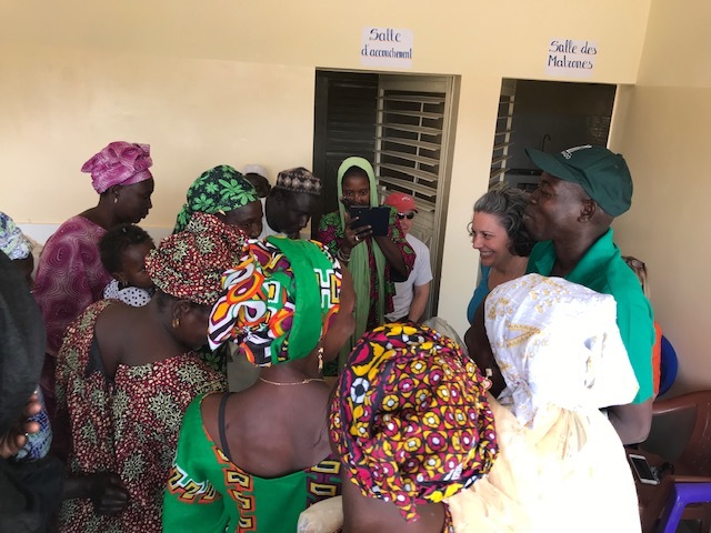 Midwives receiving a distribution of medical supplies.