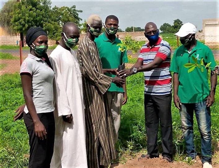 The Mayor of Keur Soce along with his Deputy and the Andando staff ceremonially planting a tree in honor of Senegal’s Arbor Day.