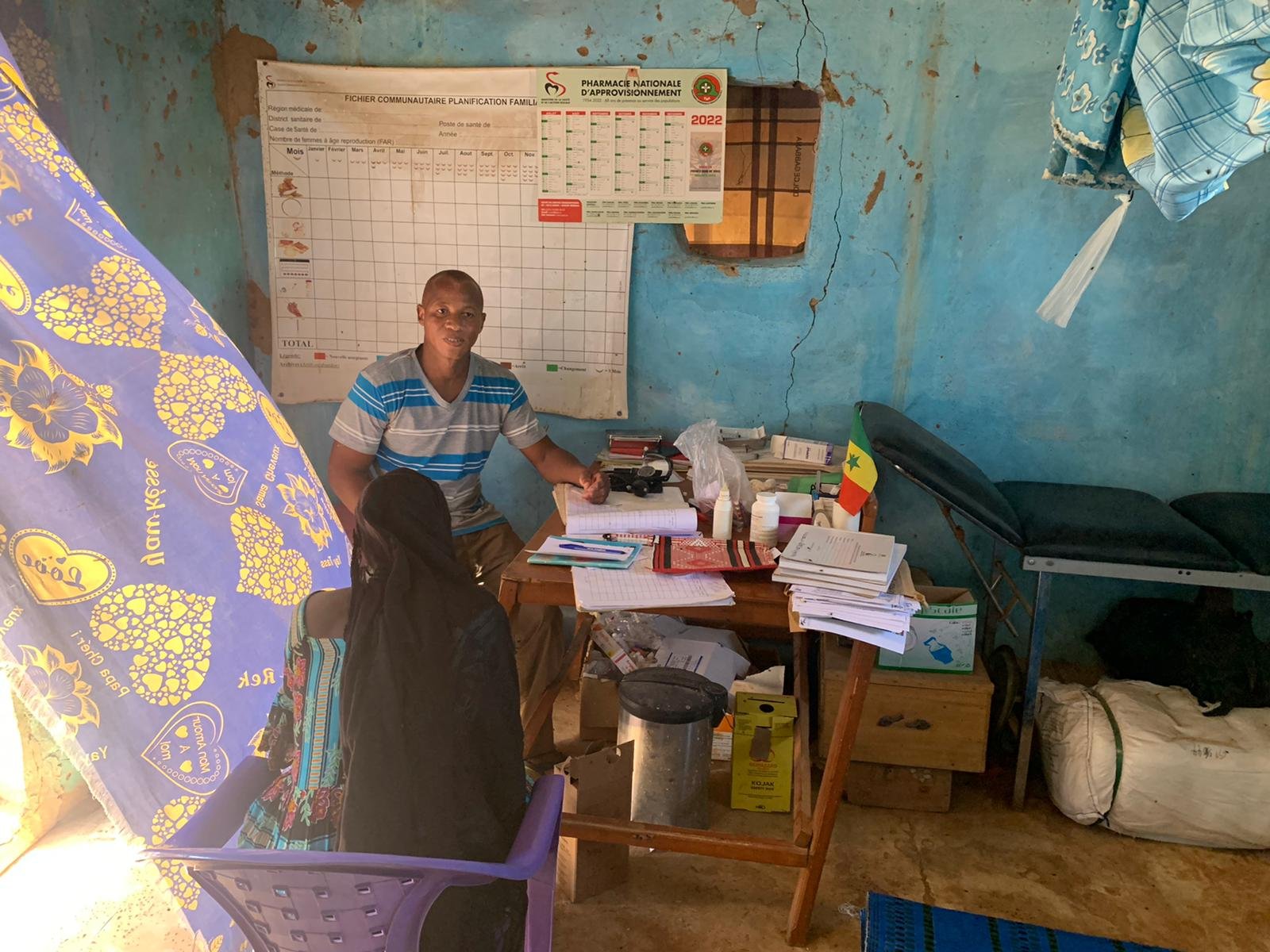 One of the health care workers inside the existing health post at Seno Bowal.  The existing buiding will be replaced with a new structure with running water, electricity, and private rooms.