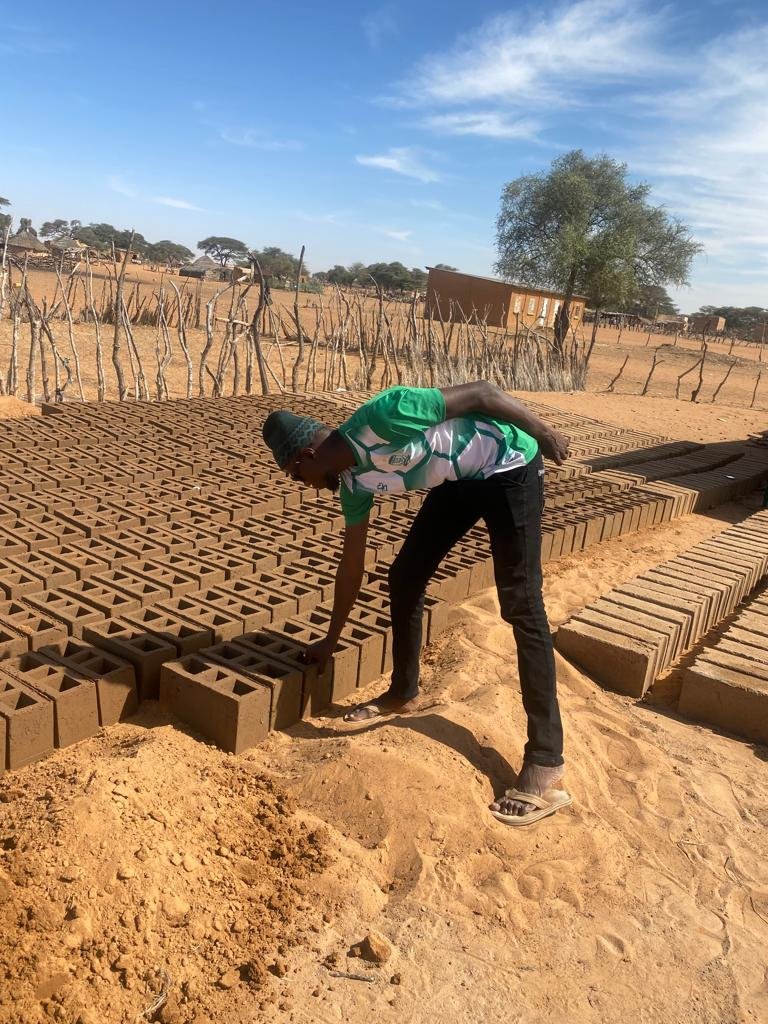 Bricks are formed and cured on-site.  These will be used for the foundation and walls of the Seno Bowal Health Post.