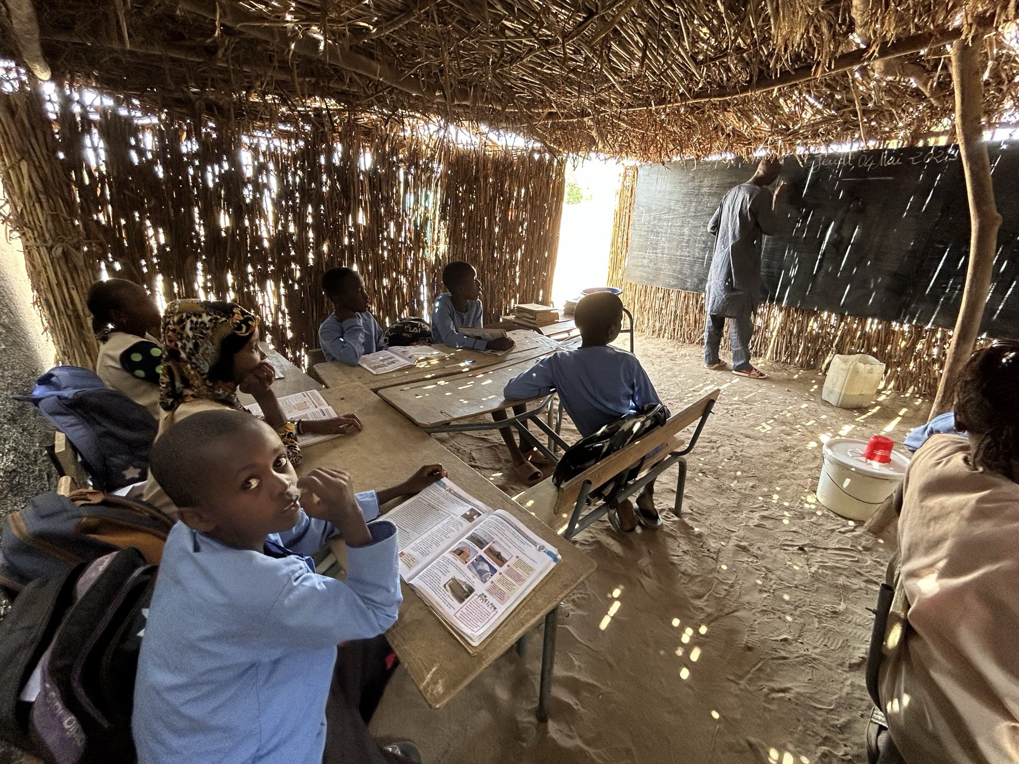 04_Students from Mbadhiou Peulh studying in temporary classrooms 2.JPEG