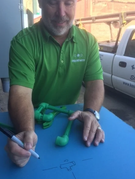 Kevin payne instructs me on the Aquatherm fusion process.