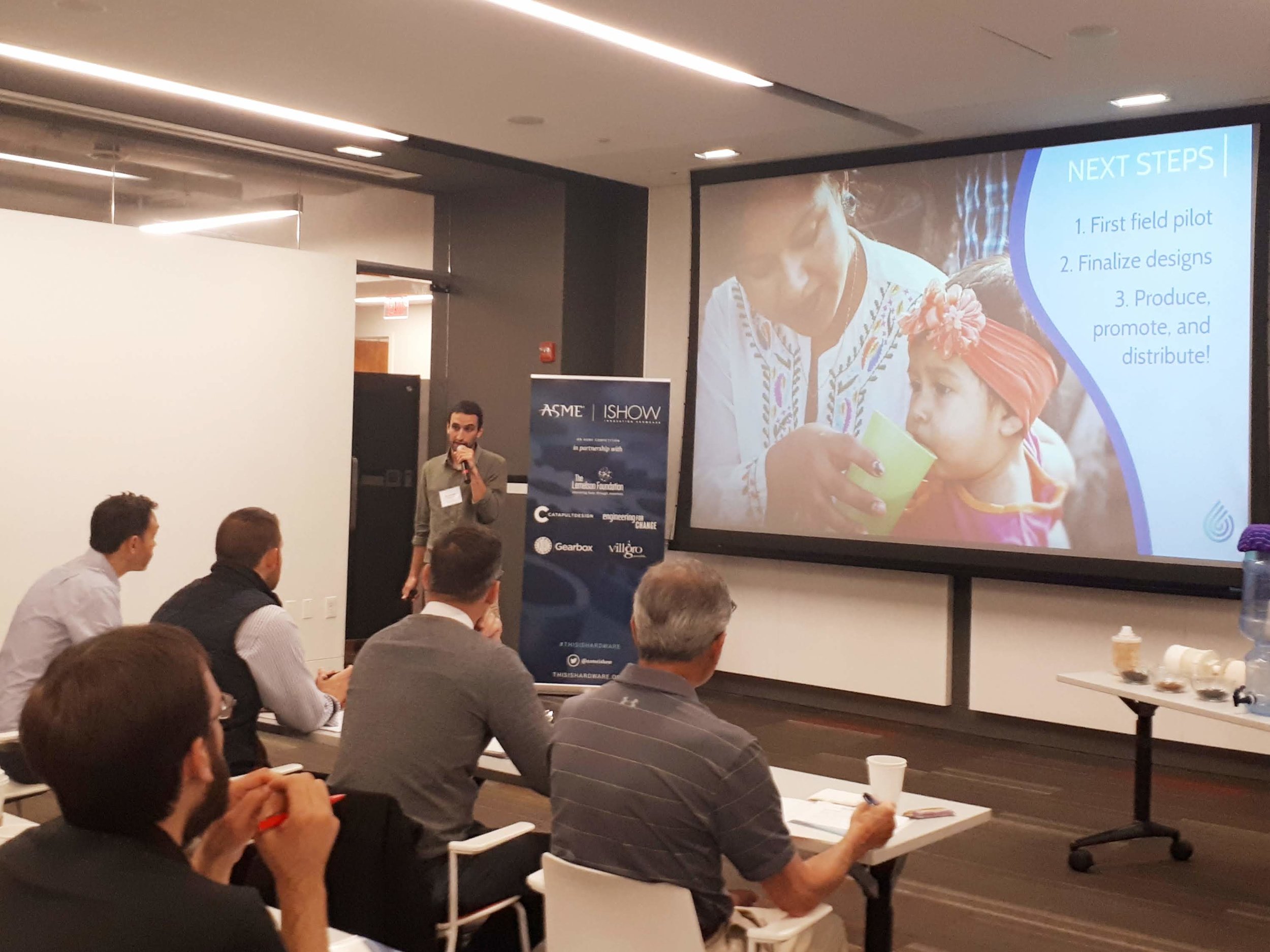 Aaron Krupp presents the need for solutions like Aguadapt to a panel of expert judges from around the world.