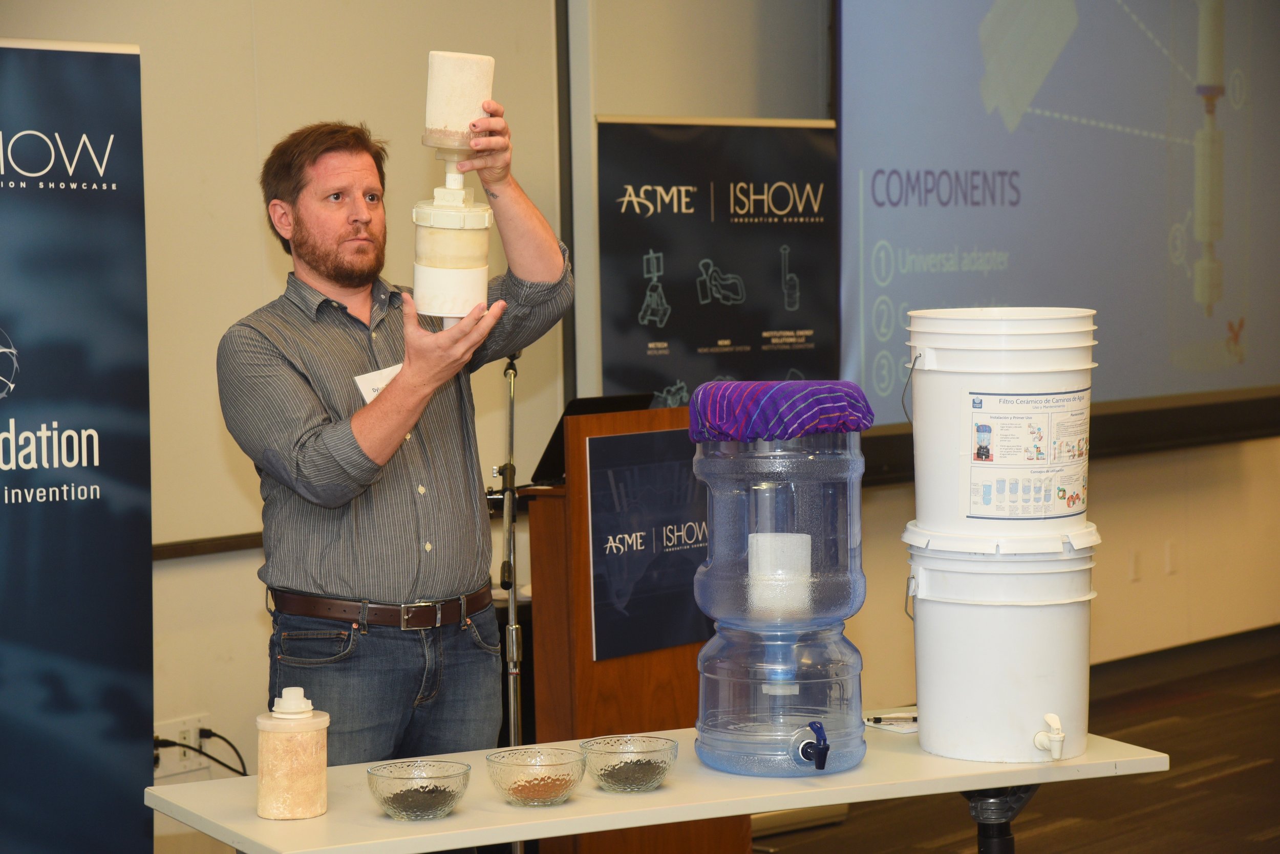  Dylan Terrell illustrates to the judges how to easily integrate additional treatments steps for emerging chemical contaminants like arsenic, fluoride, and agro-chemicals.   