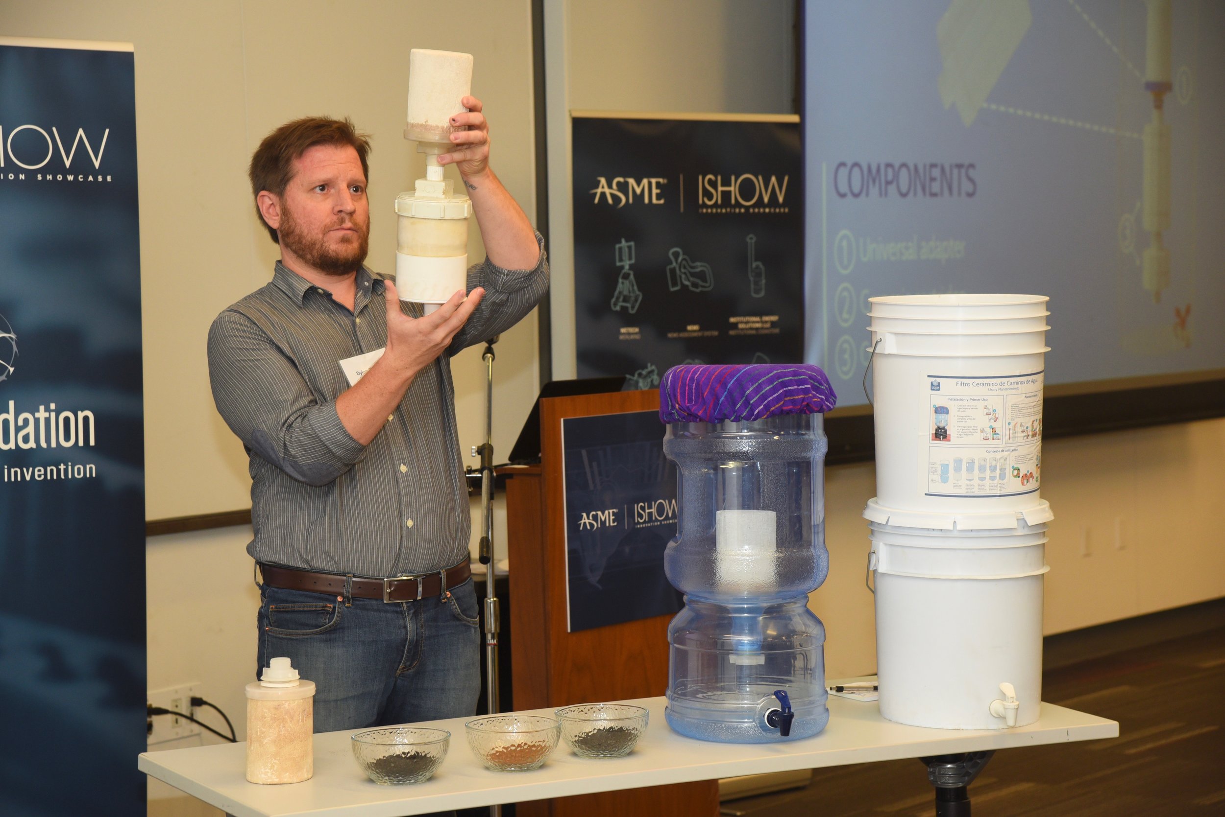 Dylan Terrell illustrates to the judges how to easily integrate additional treatments steps for emerging chemical contaminants like arsenic, fluoride, and agro-chemicals.
