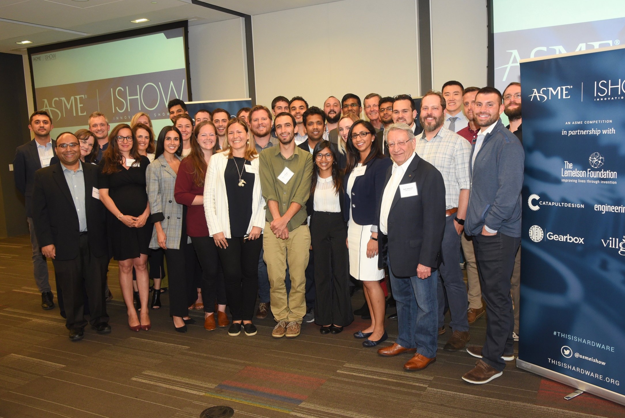 All the judges, facilitators, and finalists come together.