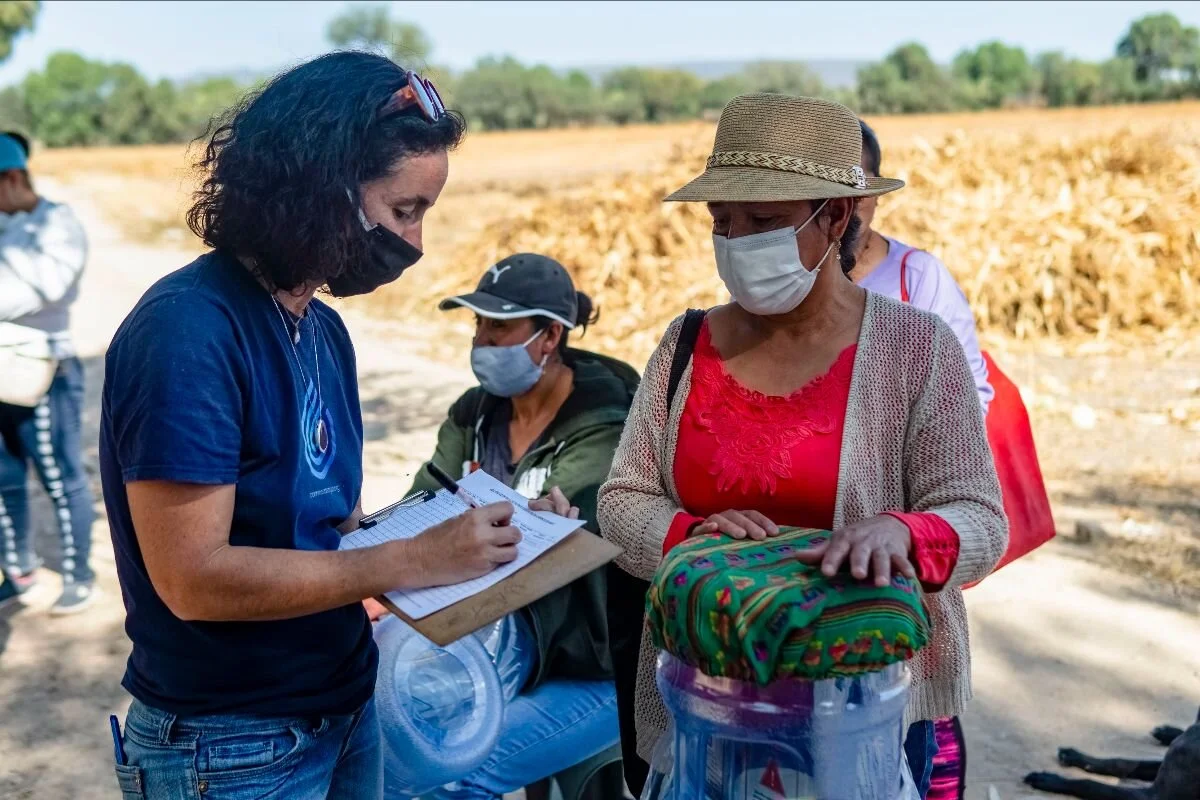 Photo: Casilda from Caminos de Agua delivering a batch of ceramic water filters.