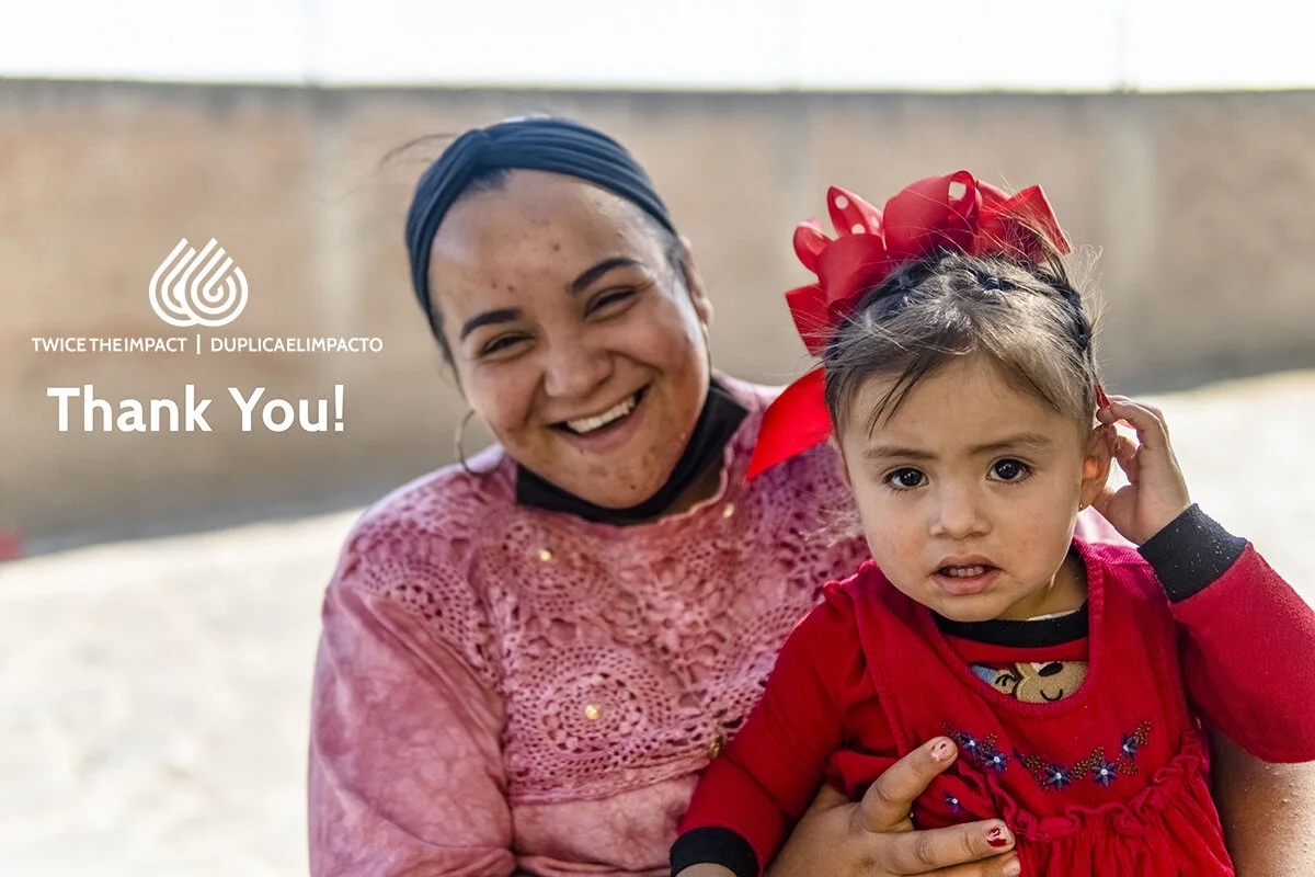 Photo: Cristina, from the El Fraile community and her neighbor's daughter smile for the camera.