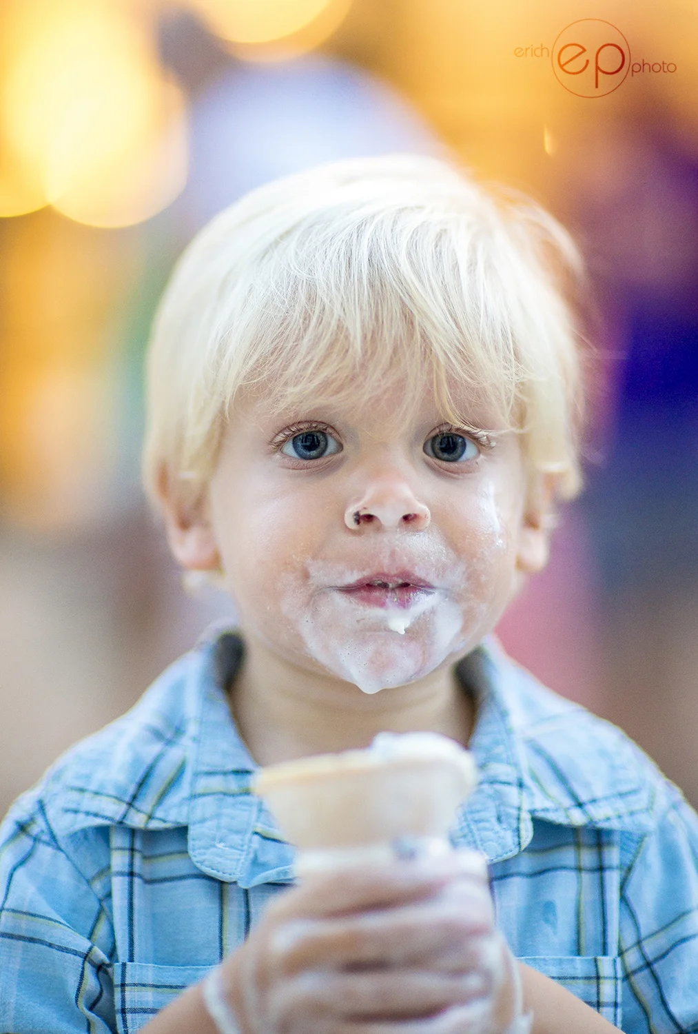 Yep, that's ice cream in his nose, and a chocolate chip perched on the edge. I wonder if that enhances the experience...
