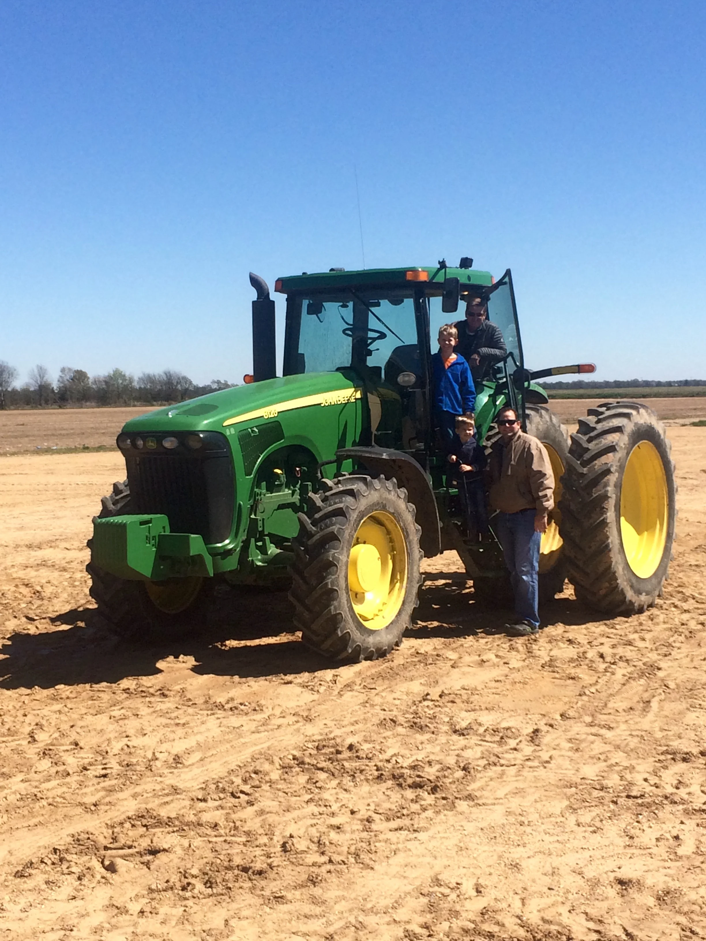 Family enjoying a tractor ride