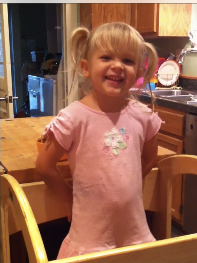 my daughter standing on the Learning Tower