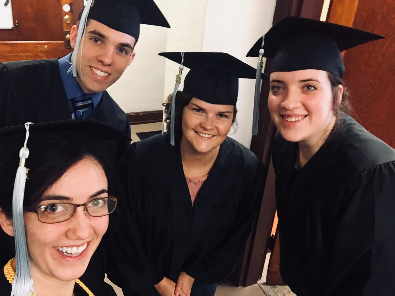 Posing with Education Majors before we came down the aisle — Travis Stroup, Heidi Potter, and Morgan Martin