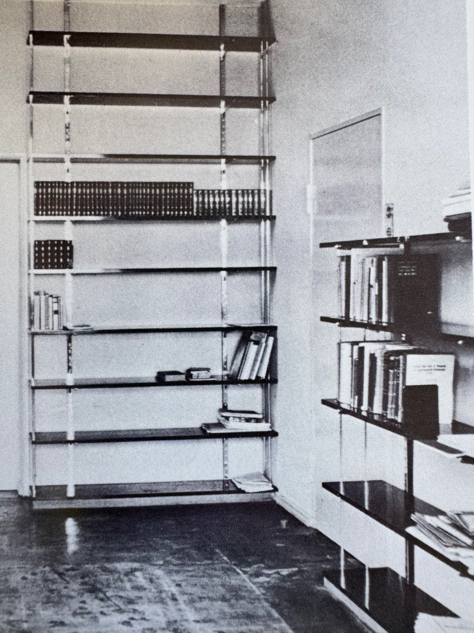 Bookshelf in study, 1930, p. 93