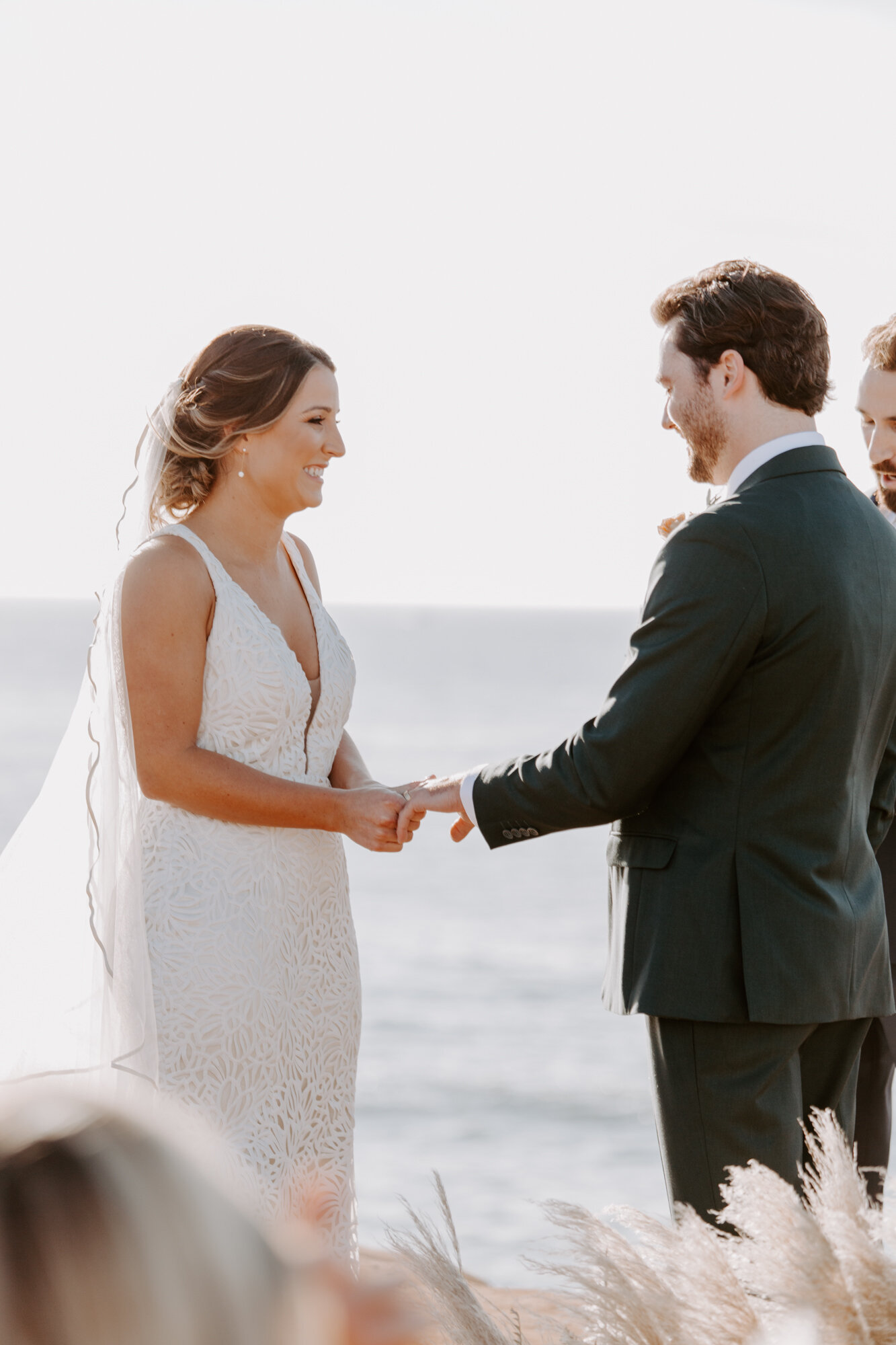 Sunset cliffs wedding, elopement in point loma san diego. Wedding and elopement with pampas grass and pink tones in the bouquets. This was a bohemian or boho styled wedding near the beach.