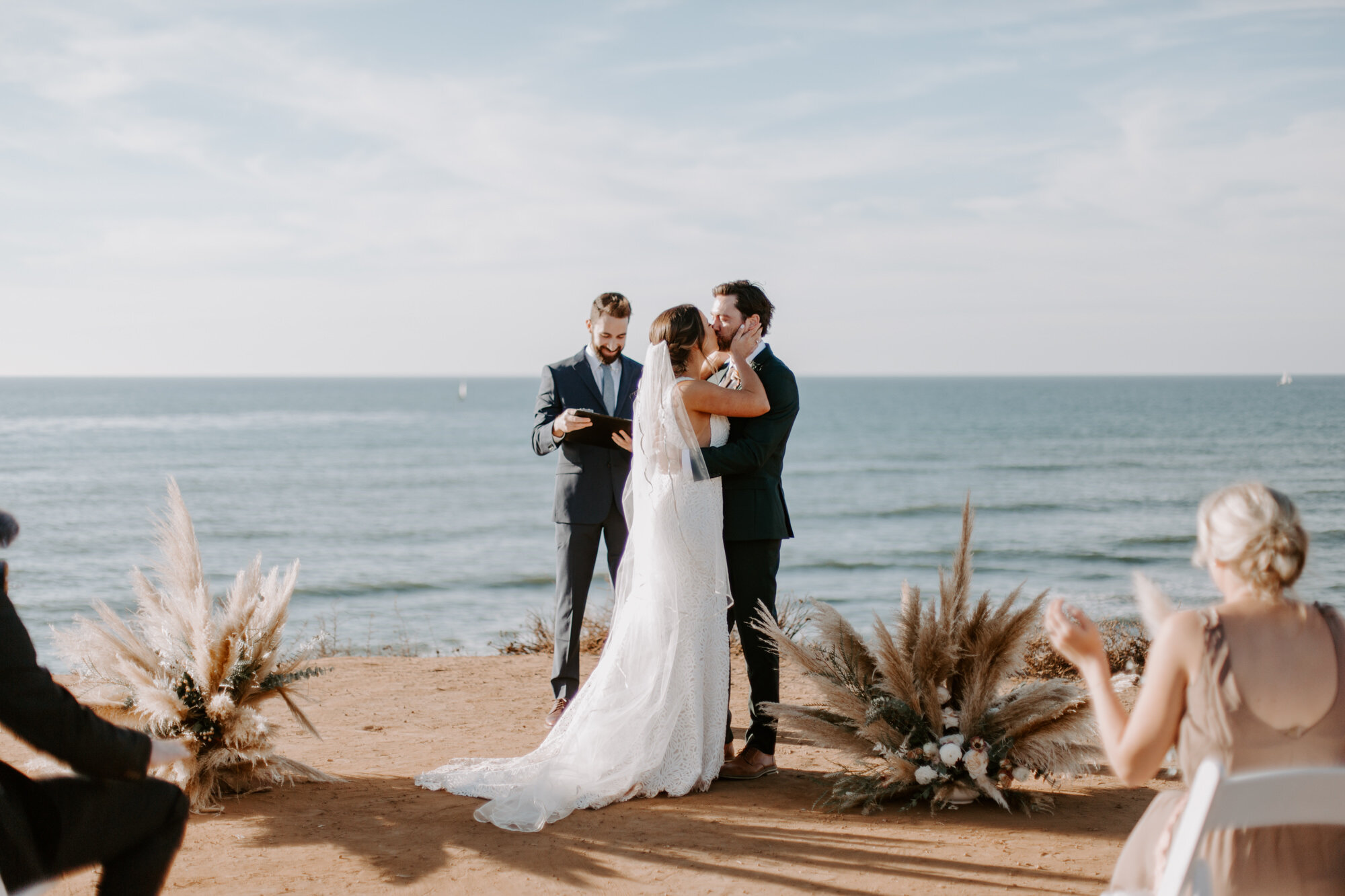 Sunset cliffs wedding, elopement in point loma san diego. Wedding and elopement with pampas grass and pink tones in the bouquets. This was a bohemian or boho styled wedding near the beach.