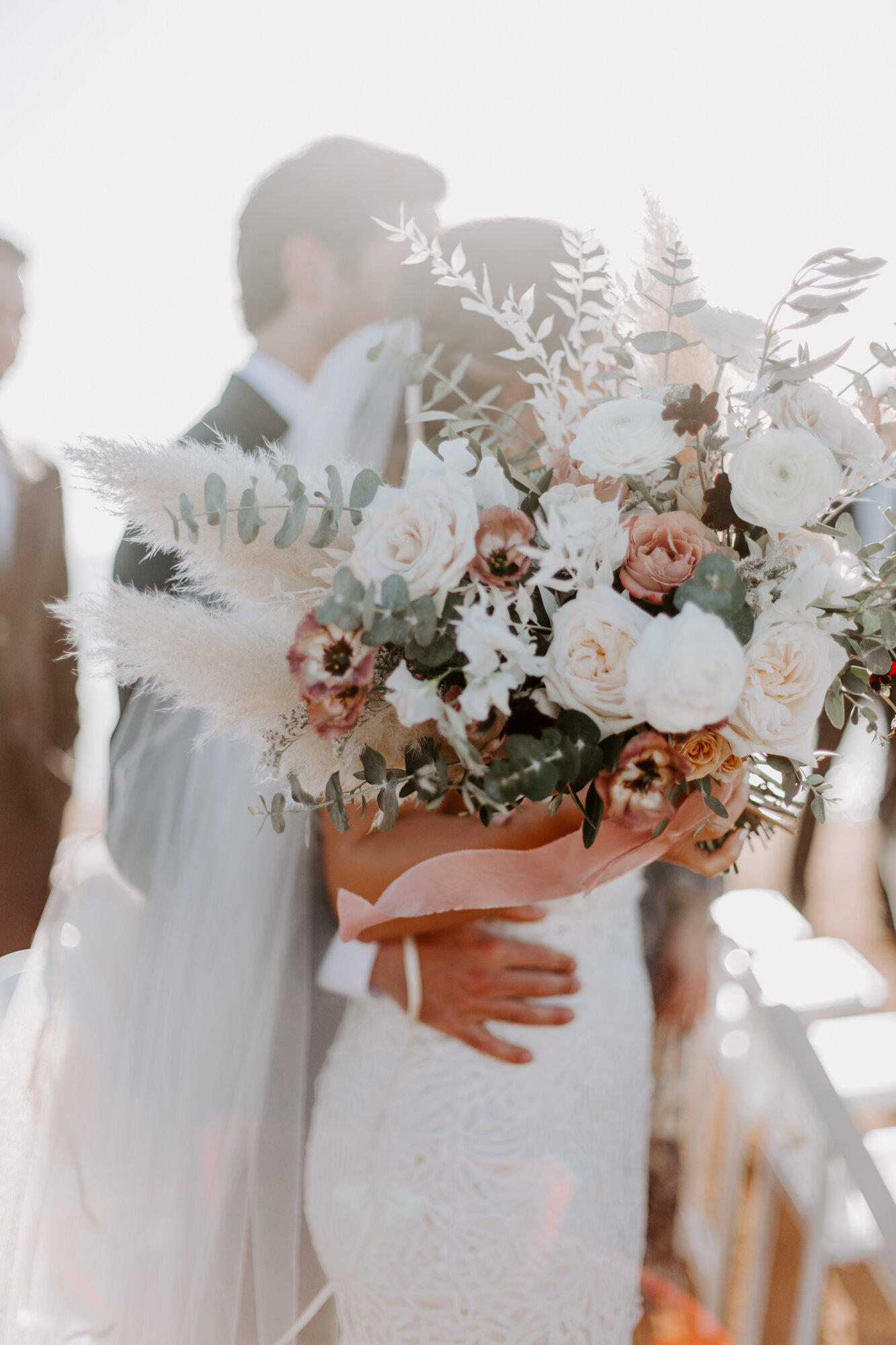 Sunset cliffs wedding, elopement in point loma san diego. Wedding and elopement with pampas grass and pink tones in the bouquets. This was a bohemian or boho styled wedding near the beach.