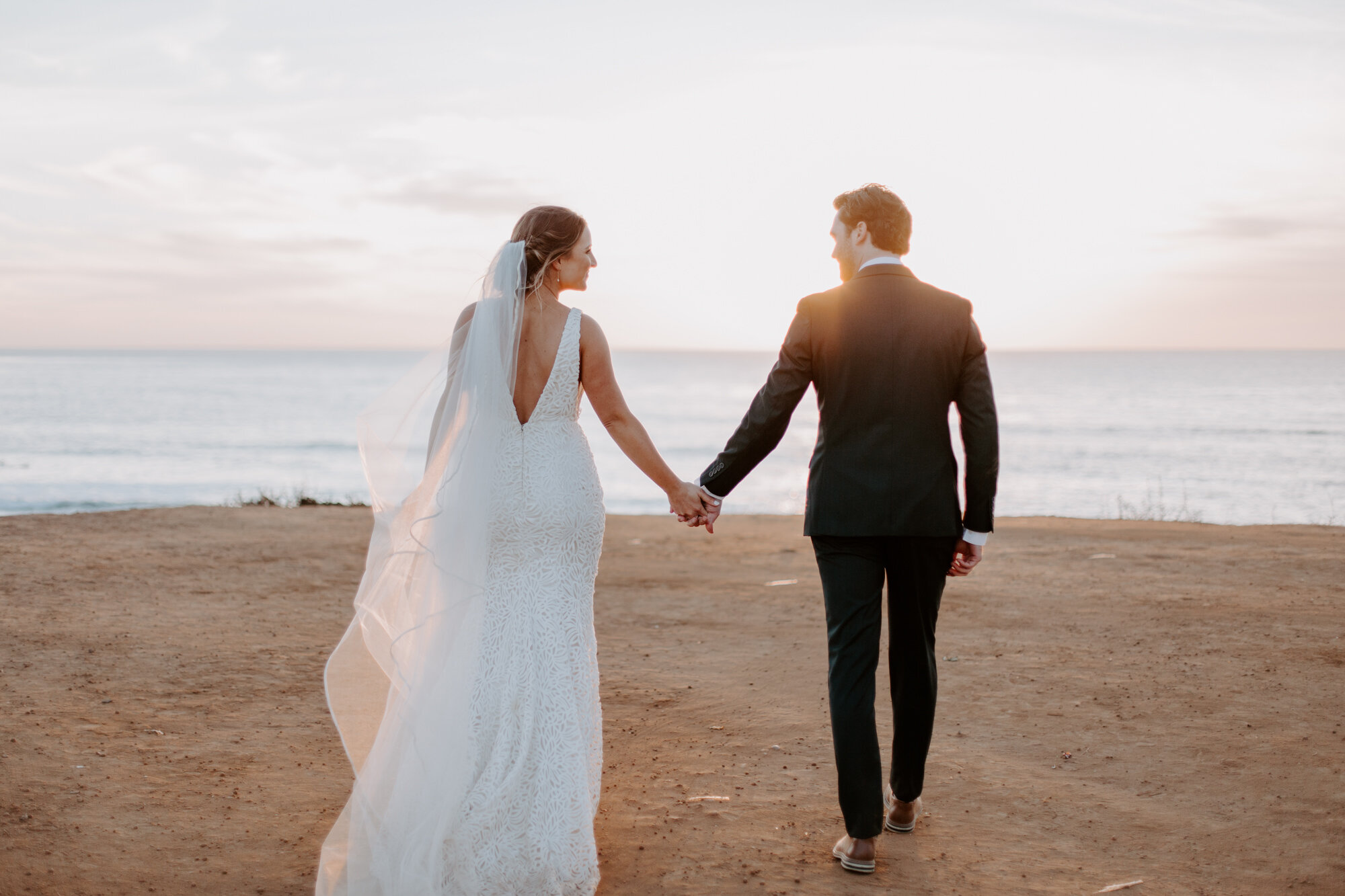 Sunset cliffs wedding, elopement in point loma san diego. Wedding and elopement with pampas grass and pink tones in the bouquets. This was a bohemian or boho styled wedding near the beach.