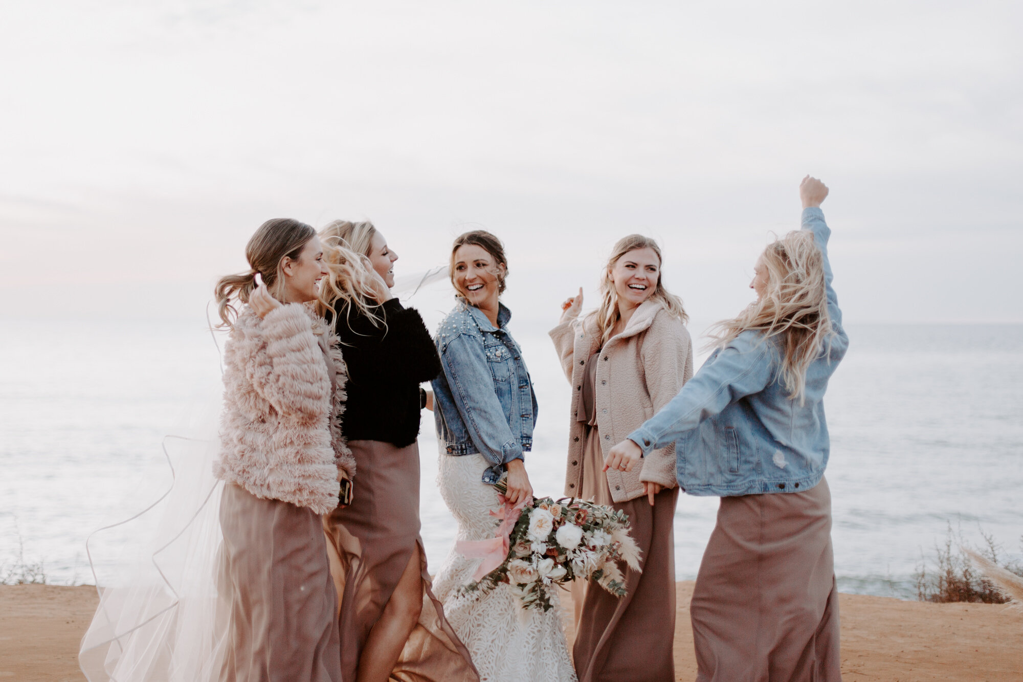 Sunset cliffs wedding, elopement in point loma san diego. Wedding and elopement with pampas grass and pink tones in the bouquets. This was a bohemian or boho styled wedding near the beach.