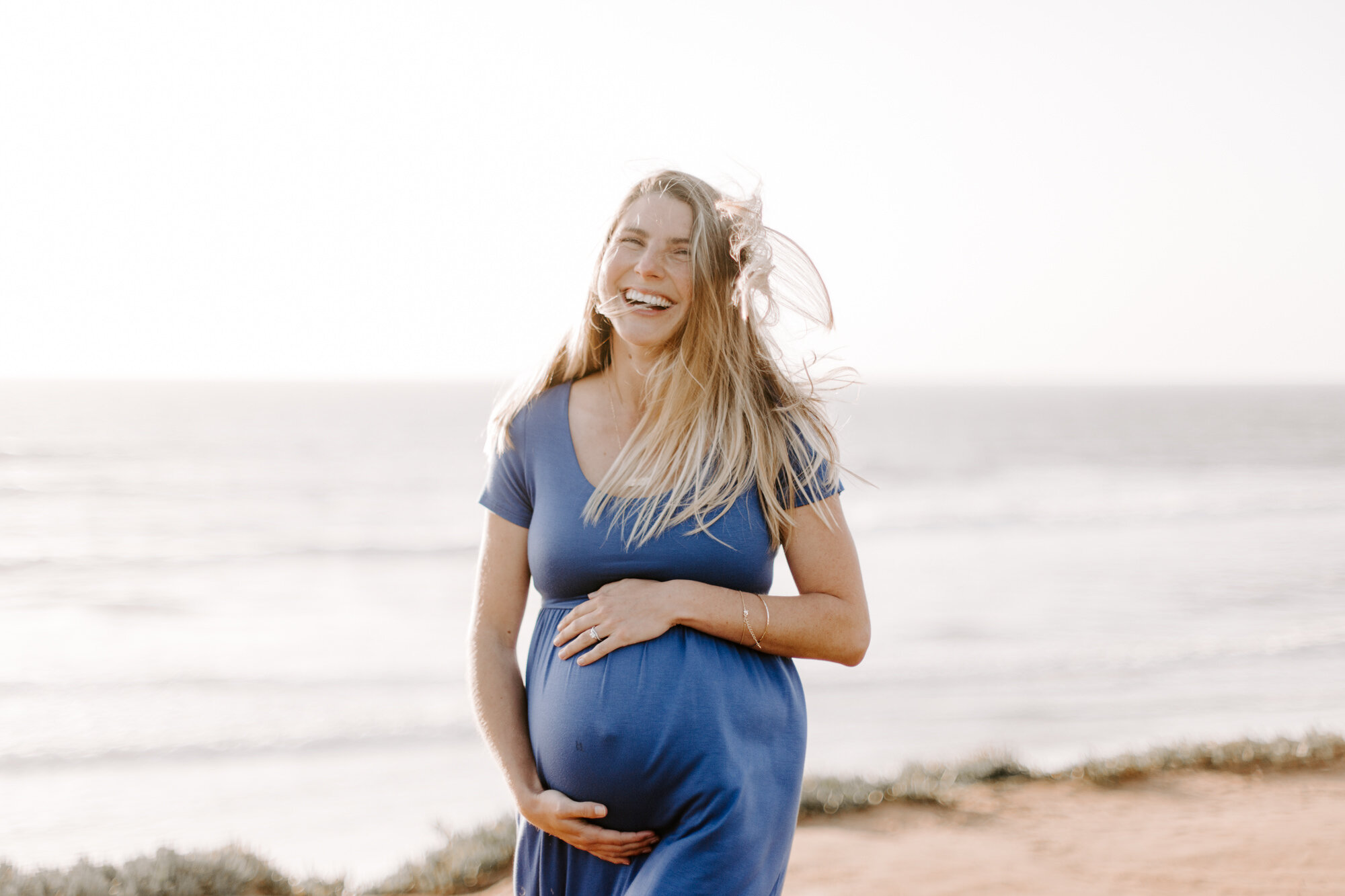 Carlsbad Bluff Maternity and Family Photo Session, San Diego. Photos taken on the beach in carlsbad near tamarack and canon exit.