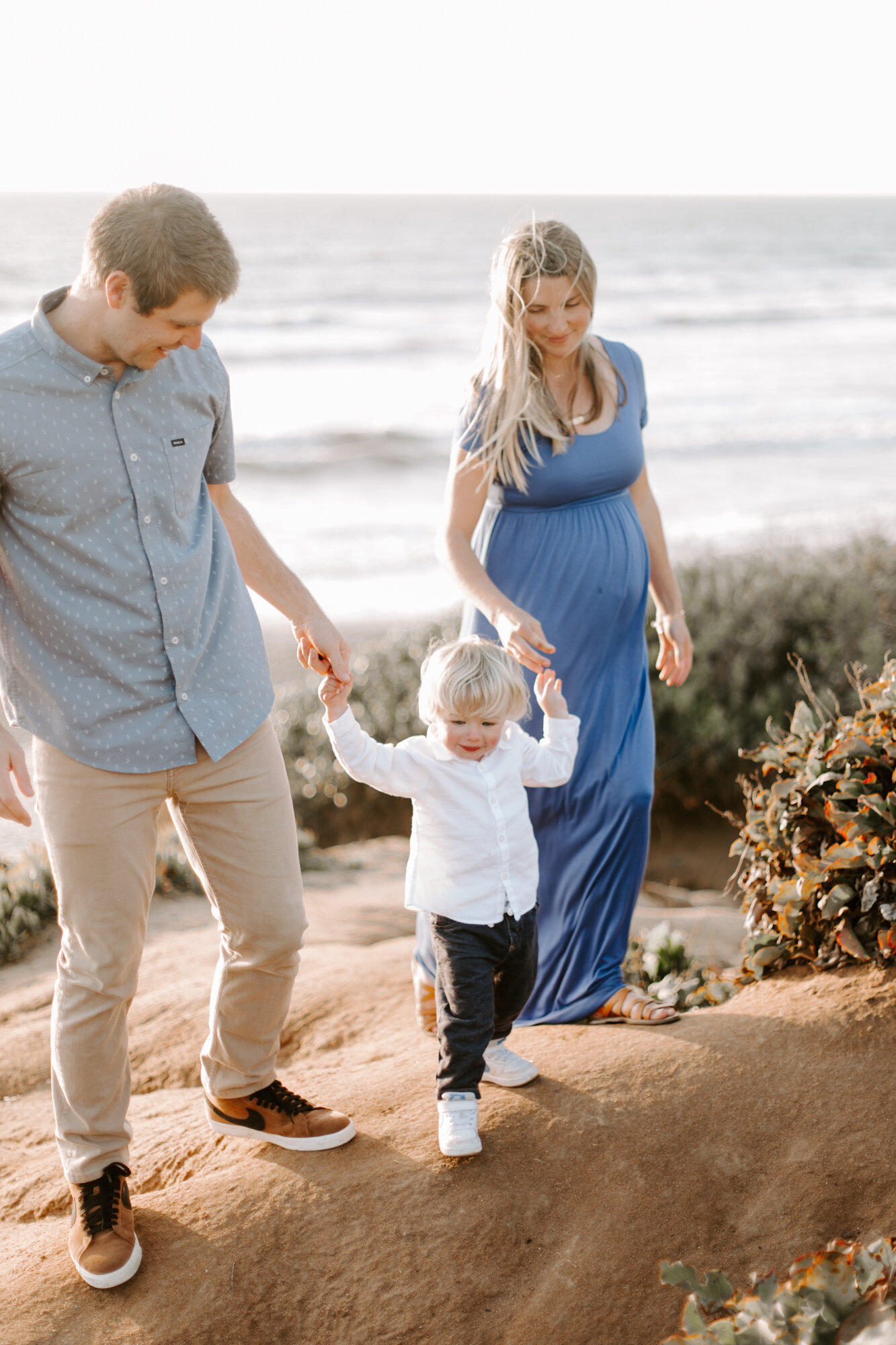 Carlsbad Bluff Maternity and Family Photo Session, San Diego. Photos taken on the beach in carlsbad near tamarack and canon exit.