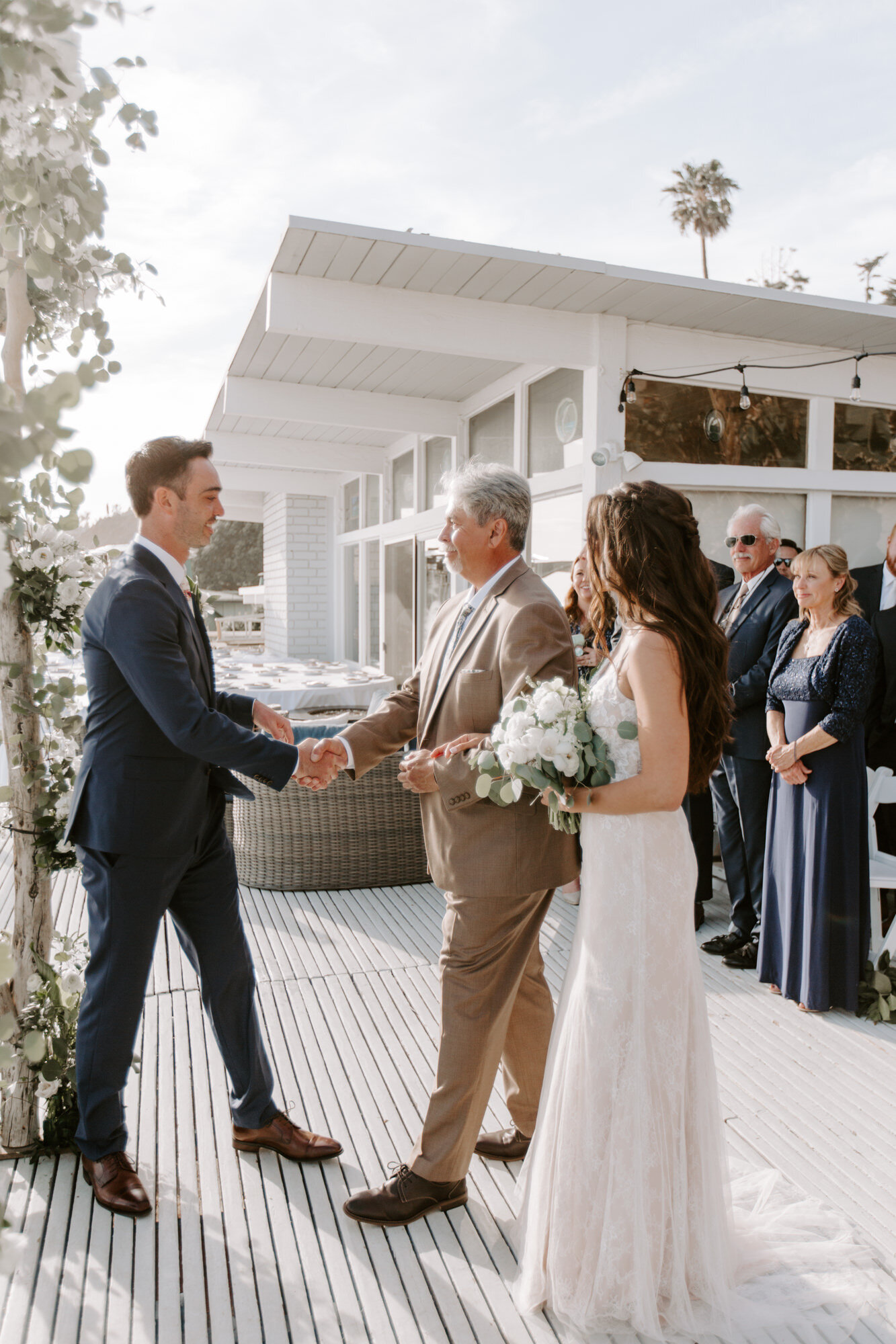 Malibu wedding photographed in Malibu california at a private home with a private beach.  Wedding photos were shot on the beach in Malibu.  This was a boho malibu wedding.  Malibu Wedding Photographer