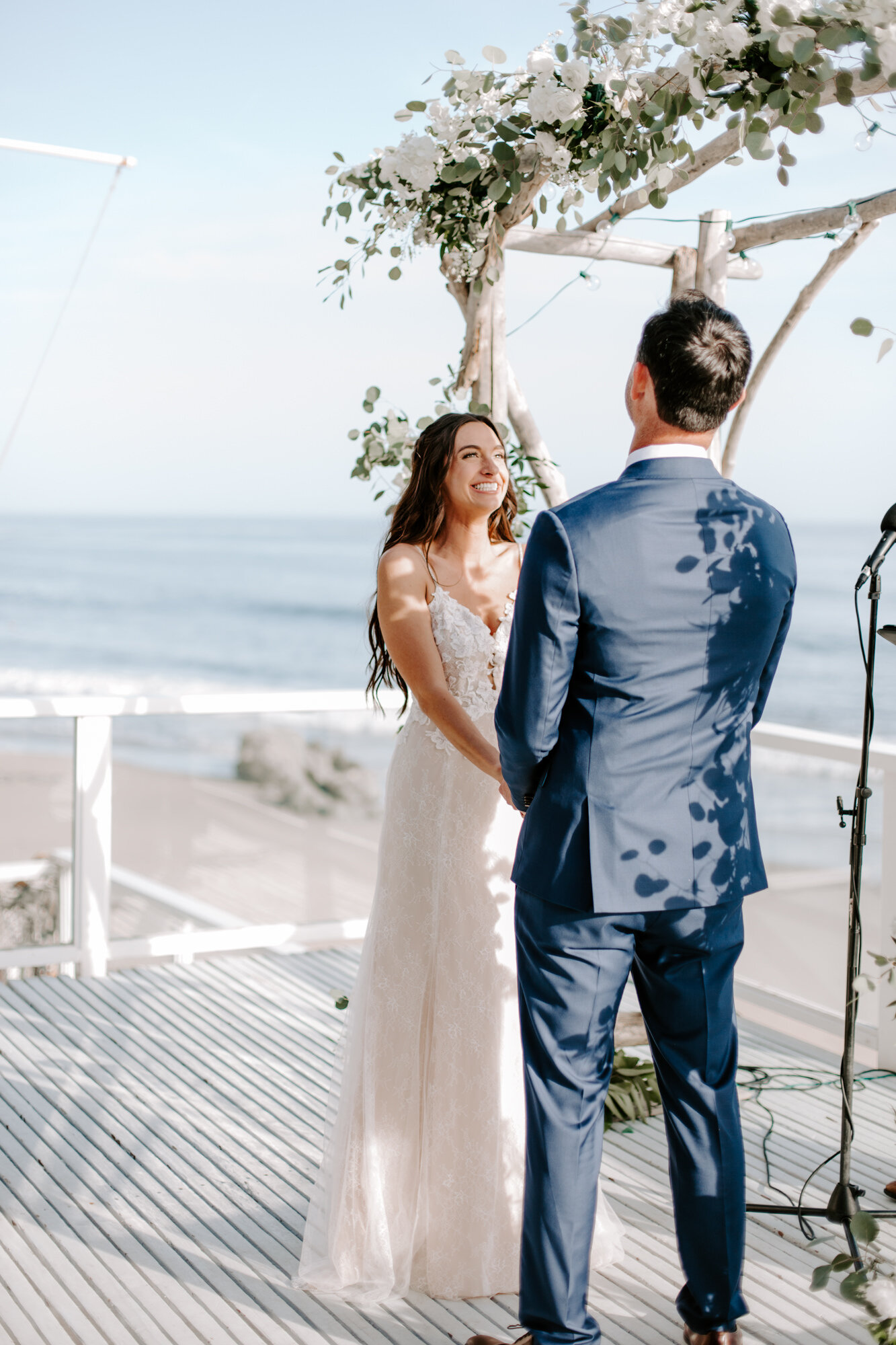 Malibu wedding photographed in Malibu california at a private home with a private beach.  Wedding photos were shot on the beach in Malibu.  This was a boho malibu wedding.  Malibu Wedding Photographer