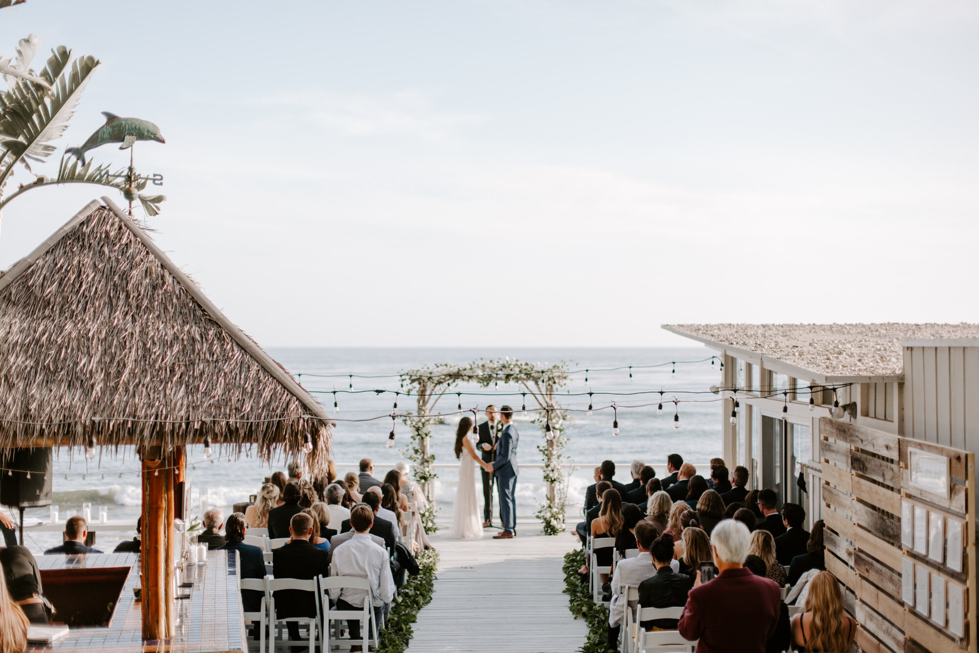 Malibu wedding photographed in Malibu california at a private home with a private beach.  Wedding photos were shot on the beach in Malibu.  This was a boho malibu wedding.  Malibu Wedding Photographer