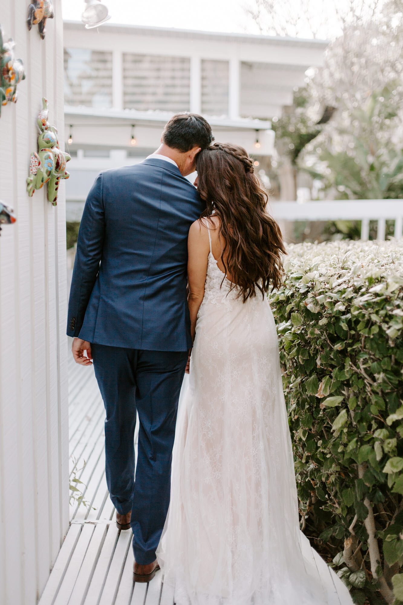 Malibu wedding photographed in Malibu california at a private home with a private beach.  Wedding photos were shot on the beach in Malibu.  This was a boho malibu wedding.  Malibu Wedding Photographer