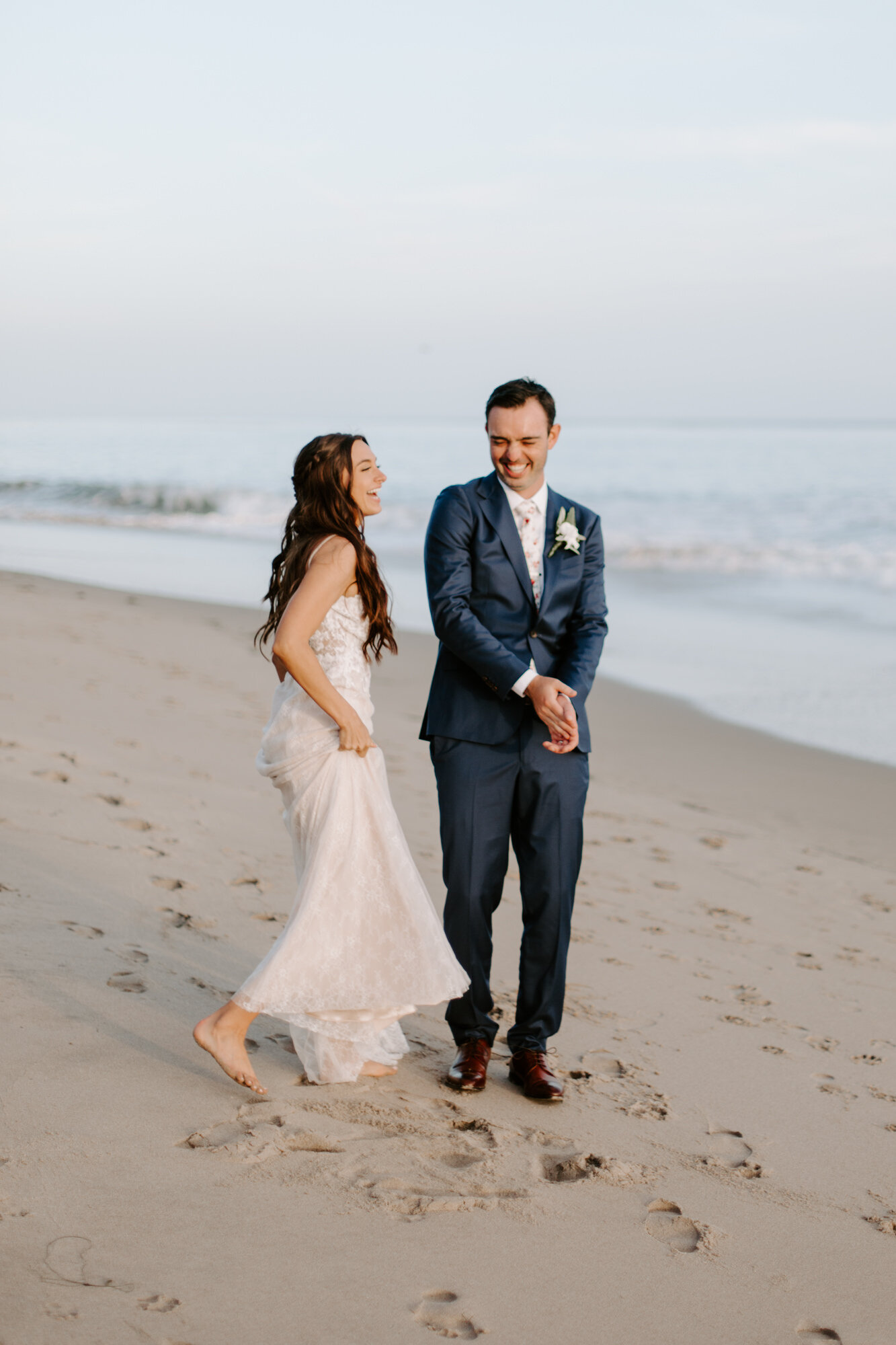 Malibu wedding photographed in Malibu california at a private home with a private beach.  Wedding photos were shot on the beach in Malibu.  This was a boho malibu wedding.  Malibu Wedding Photographer