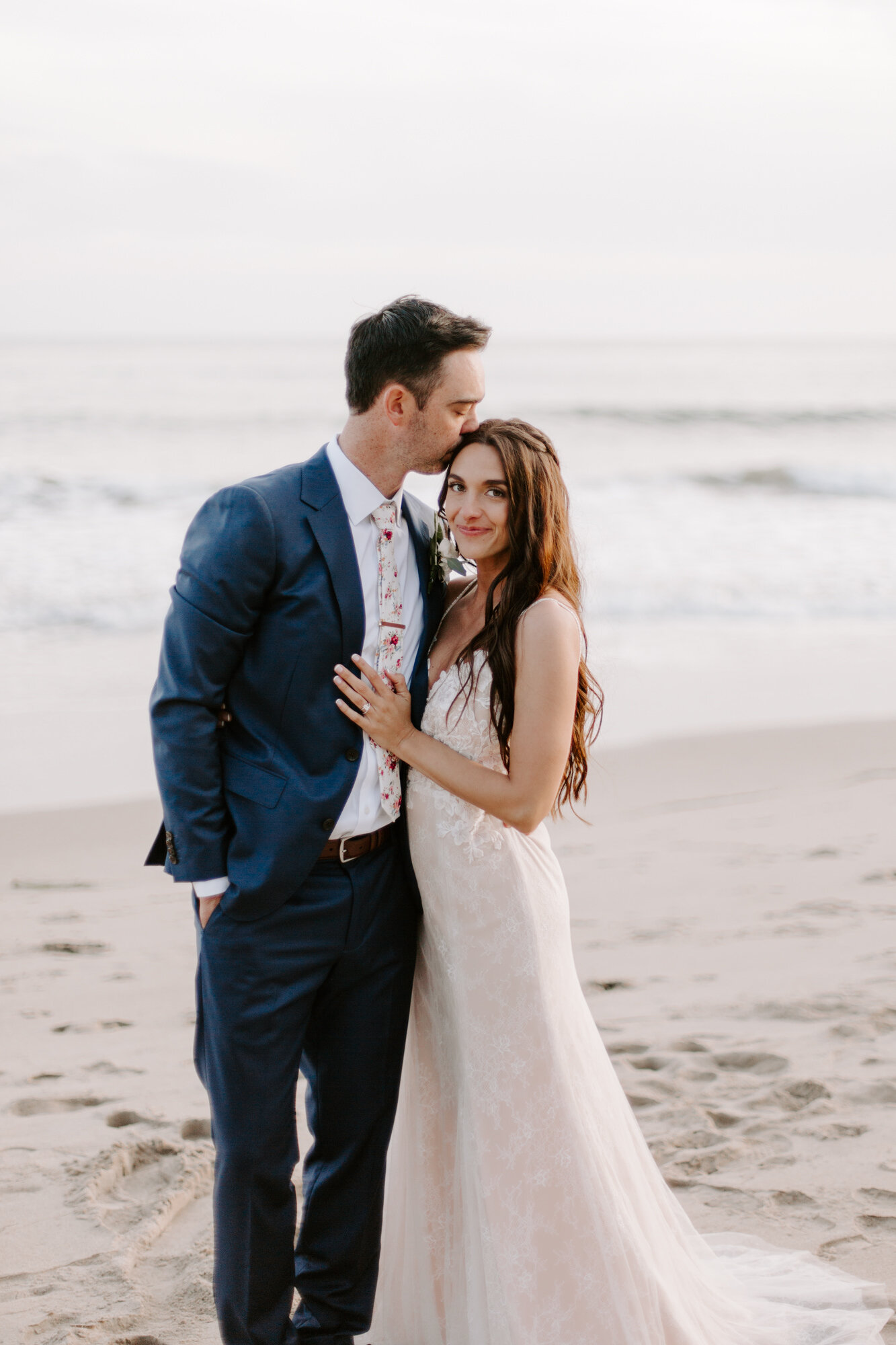 Malibu wedding photographed in Malibu california at a private home with a private beach.  Wedding photos were shot on the beach in Malibu.  This was a boho malibu wedding.  Malibu Wedding Photographer