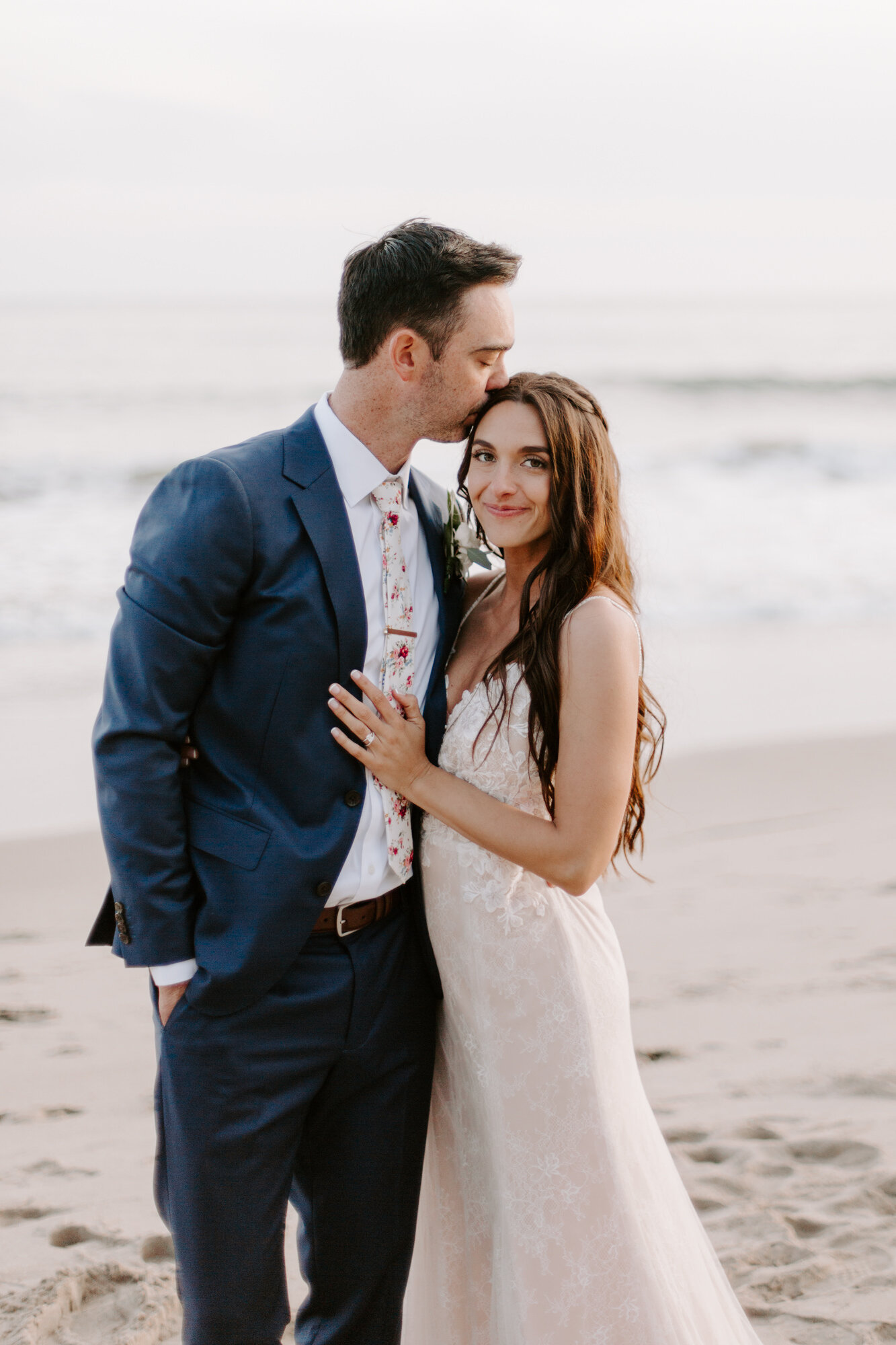 Malibu wedding photographed in Malibu california at a private home with a private beach.  Wedding photos were shot on the beach in Malibu.  This was a boho malibu wedding.  Malibu Wedding Photographer