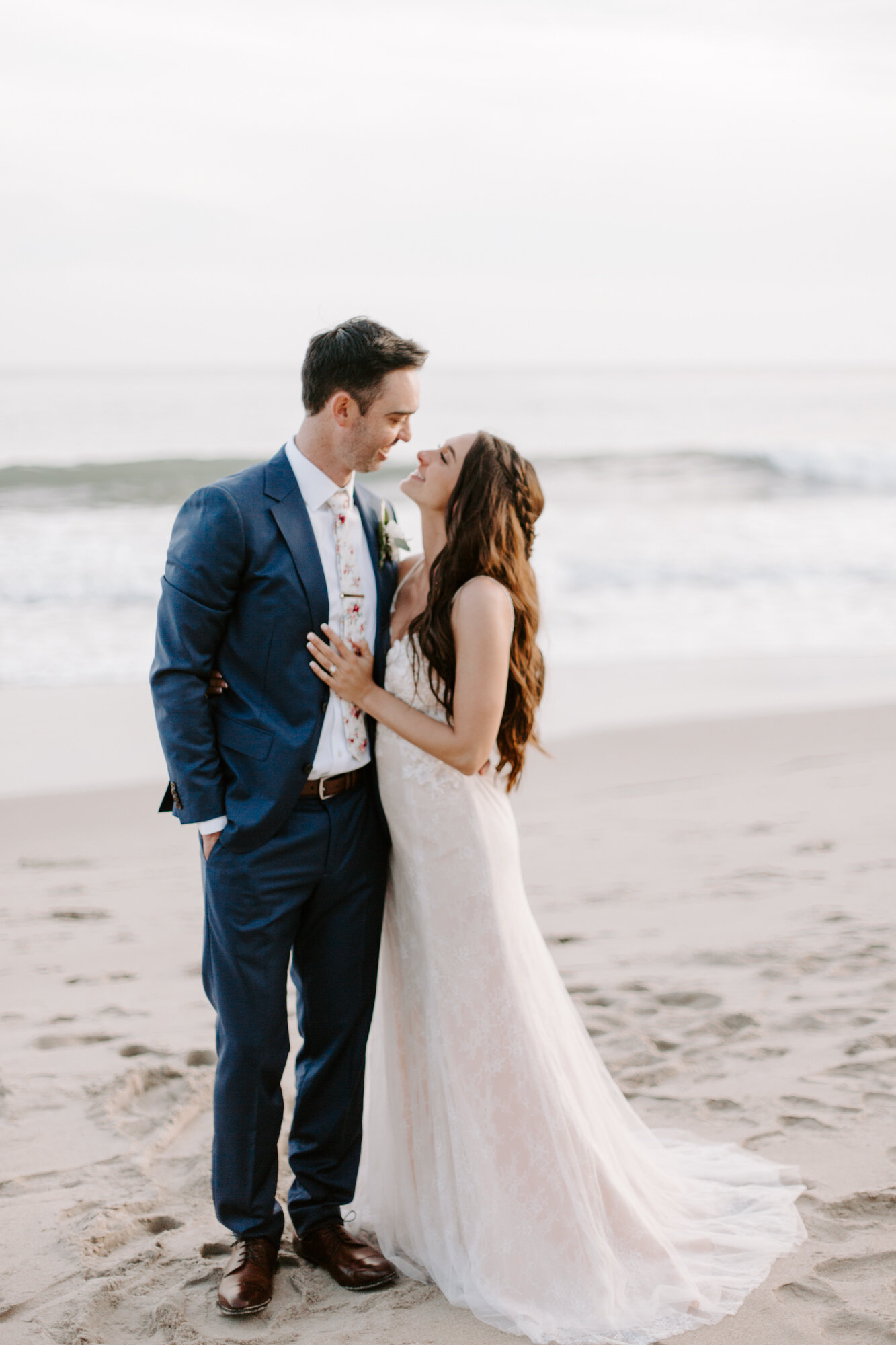 Malibu wedding photographed in Malibu california at a private home with a private beach.  Wedding photos were shot on the beach in Malibu.  This was a boho malibu wedding.  Malibu Wedding Photographer
